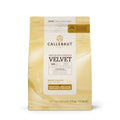 Bag of Callebaut Velvet White Chocolate Callets 2.5kg with creamy golden packaging and product details