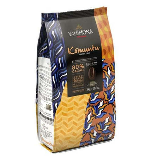 Bar of VALRHONA Komuntu 80% Dark Chocolate, showcasing its intense flavor and commitment to ethical cocoa sourcing.