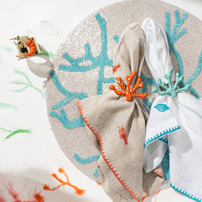 Delicate coral hand beaded placemat, turquoise