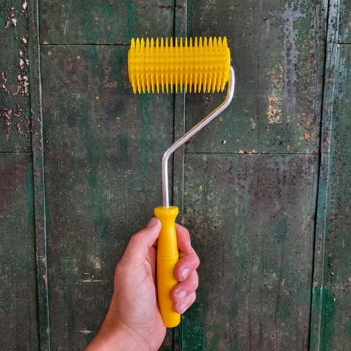 Uncapping Punch Roller