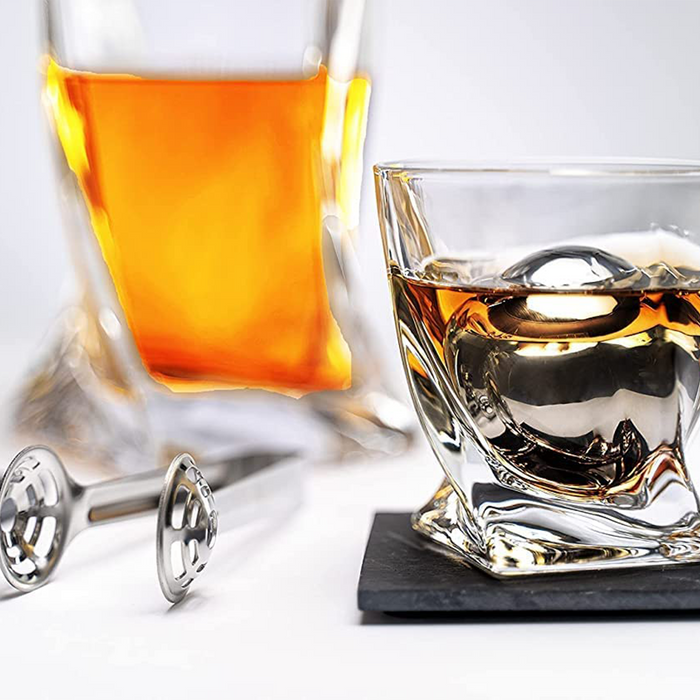 Luxurious Whiskey Stones & Glasses Gift Set - 2 XL Chilling Stainless Steel Whiskey Balls - 2x Crystal Whiskey Glasses, 2x Slate Stone Coasters, Freezer Pouch & Tongs - Set in Premium Pine Wood Box
