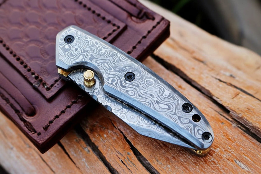 Handmade Damascus Steel Folding Knife with Dark Wood Handle & Leather Sheath