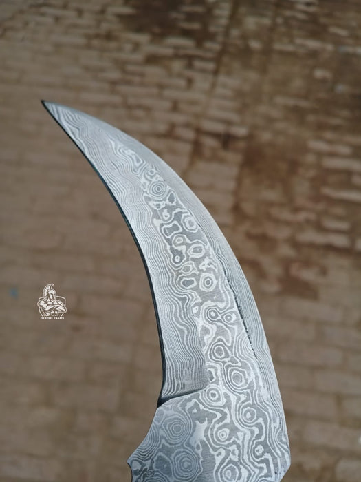 Karambit Knife with Black horn and Stainless steel handle.