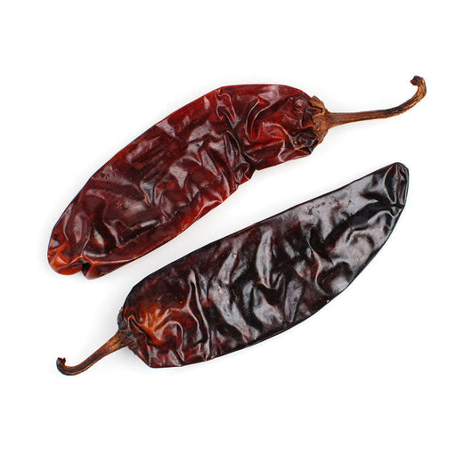 ChileRed New Mexico Hatch Chiles,  WholeMexico Hatch Chiles,Specialty Food SourceThese chiles, hailing from the Hatch Valley in New Mexico, are celebrated for their vibrant red color and balanced heat. Offering a unique earthy and slightly sweet 
